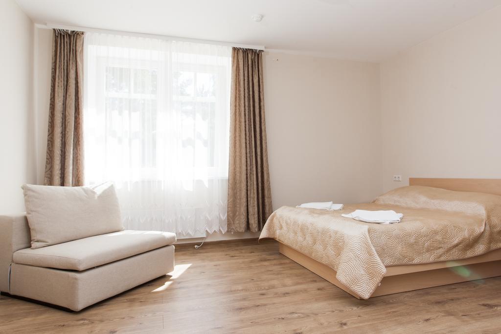 Hotel Oro Nida Habitación foto